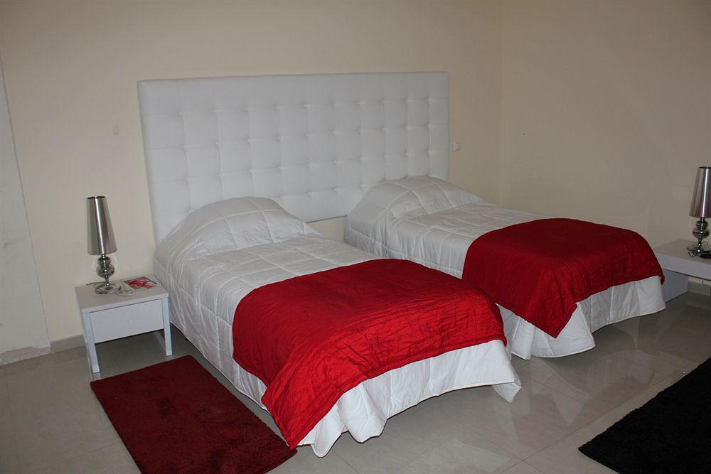 Malaika Hotel Bissau Bagian luar foto